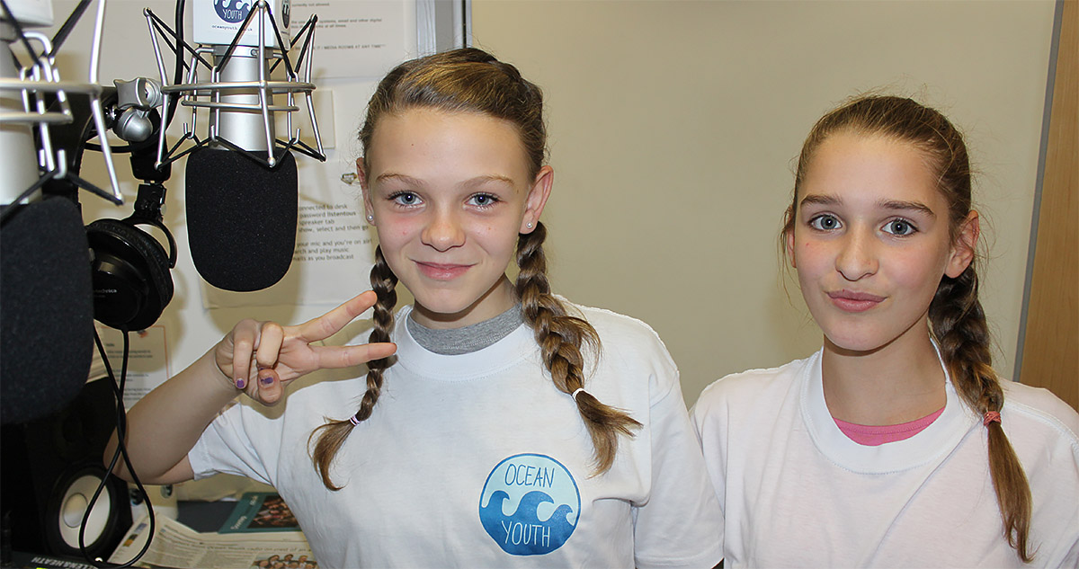 two girls attend an ocean drop in radio making session