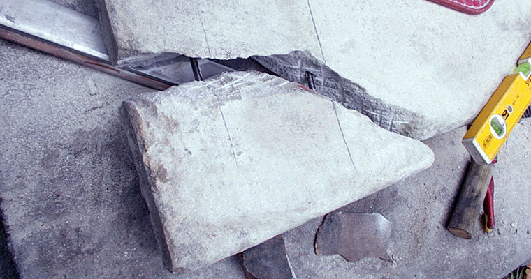 broken grave stone being repaired by london stone conservation at bunhill row ec1