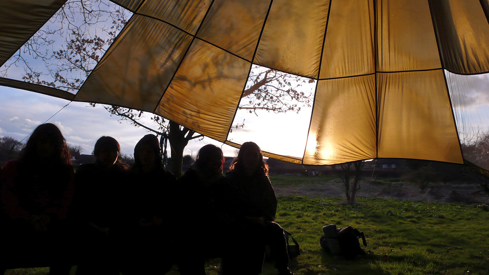 wilderness therapy participants in a triptych of images 
